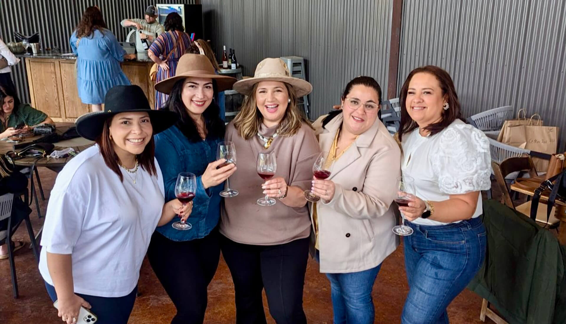 Girl's trip sipping wine in at William Chris Vineyards
